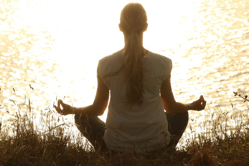 Woman Practicing Yin Yoga